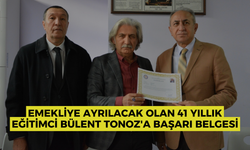 Emekliye ayrılacak olan 41 yıllık eğitimci Bülent Tonoz'a başarı belgesi